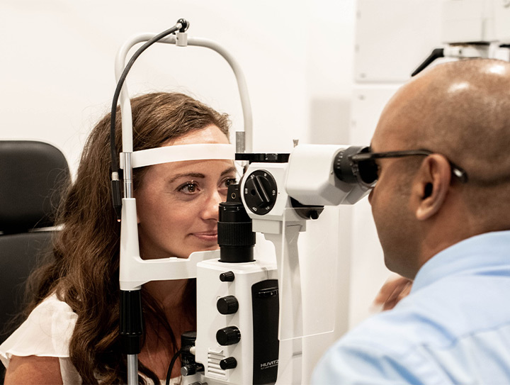 Woman getting an eye exam at Family Vision Optical