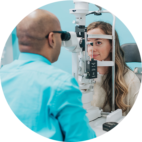 Woman getting a contact lens exam at Family Vision Optical in Allendale, MI