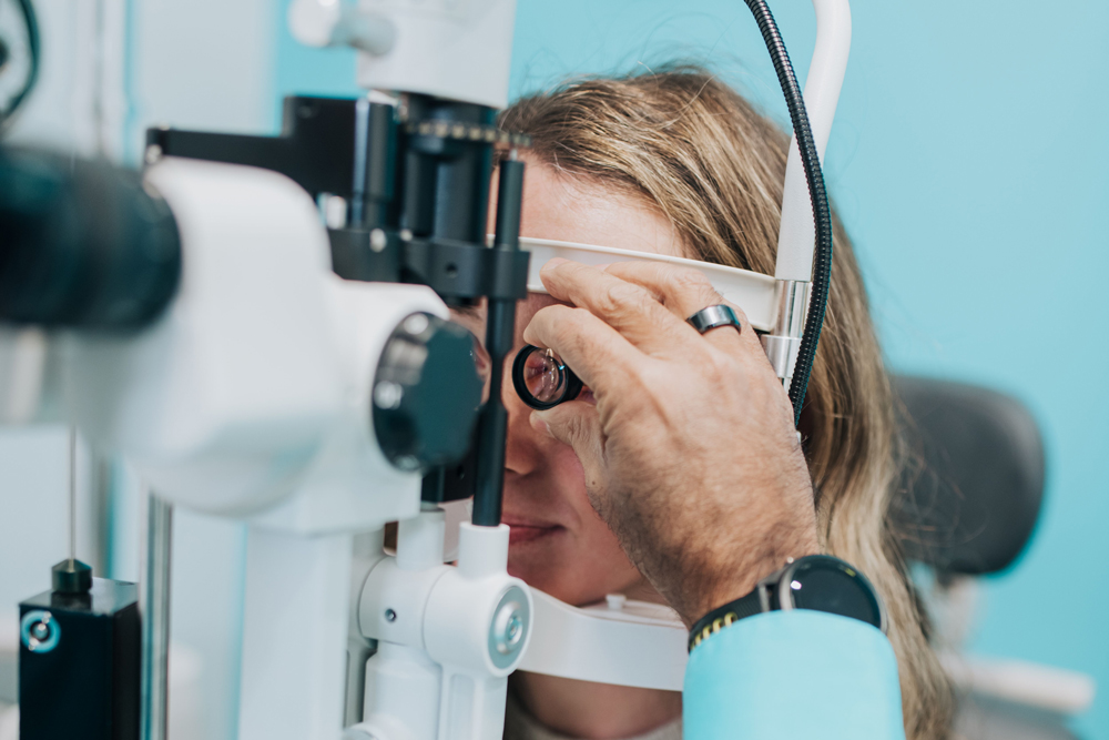 Woman getting a contact lens exam at Family Vision Optical