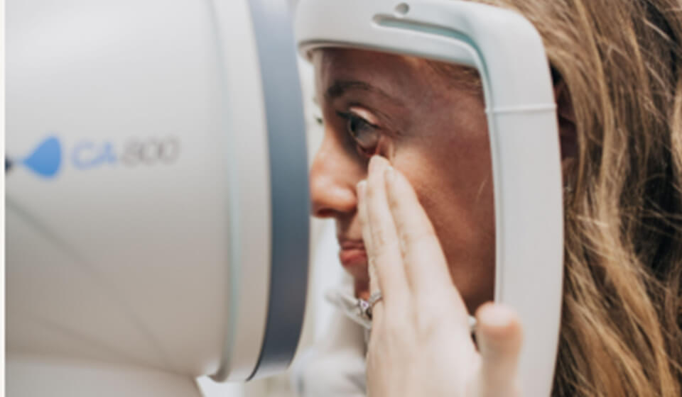 Patient getting eye disease management exam